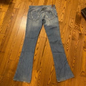 Guess light wash ultra low boot leg jeans